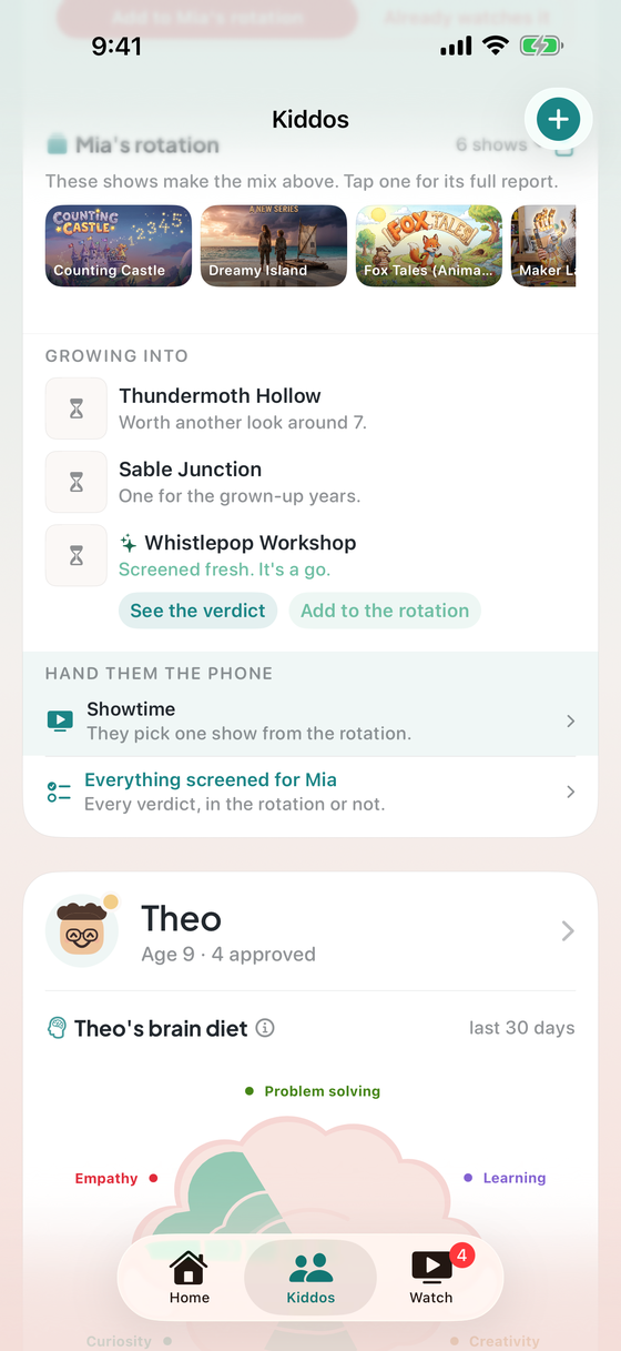 Mia's rotation on the Kiddos tab: a strip of show posters, the Growing into shelf below it, and the Hand them the phone band under that.